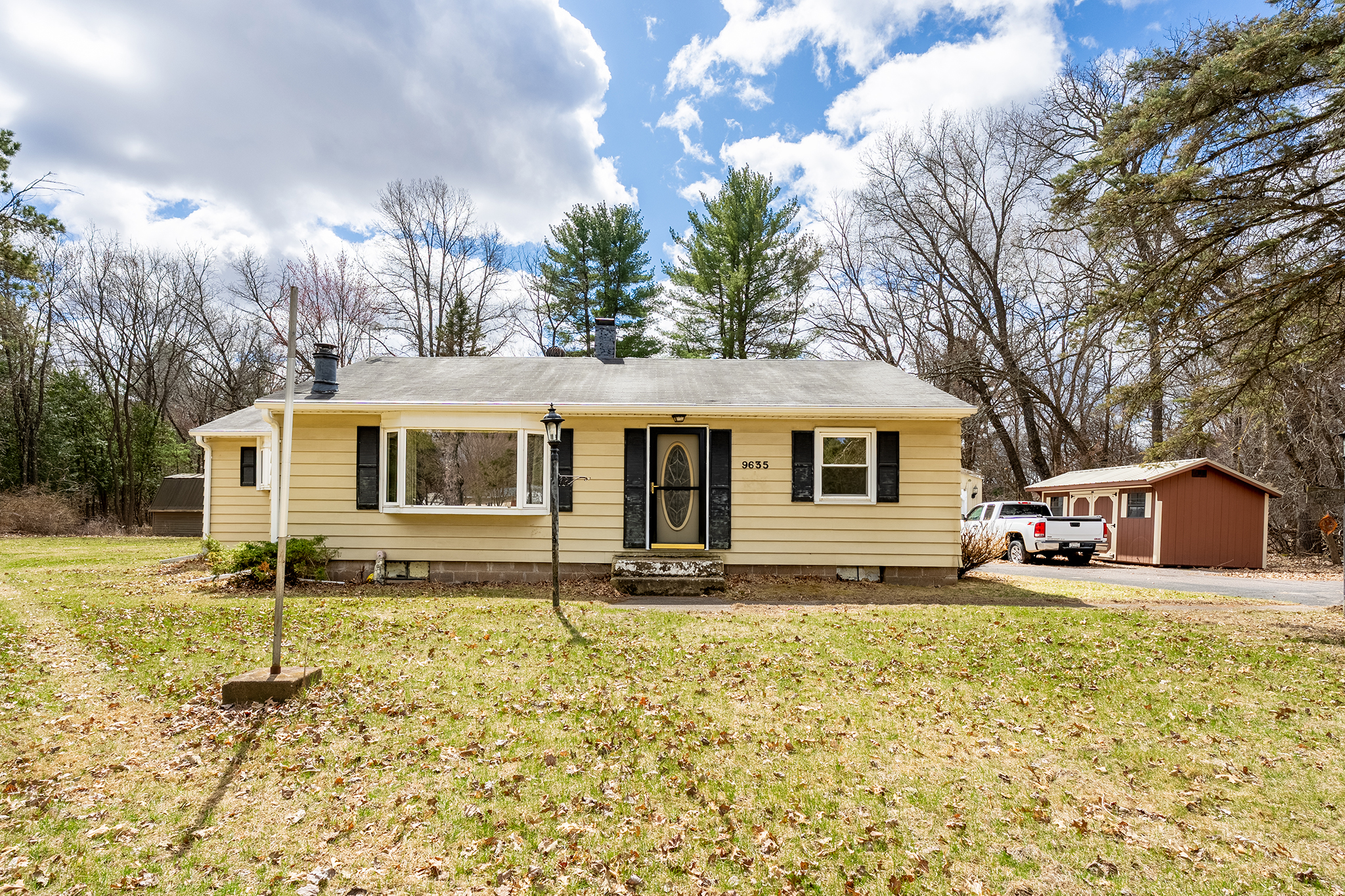 Spring home exterior in the Chippewa Valley Wisconsin during snow melt season