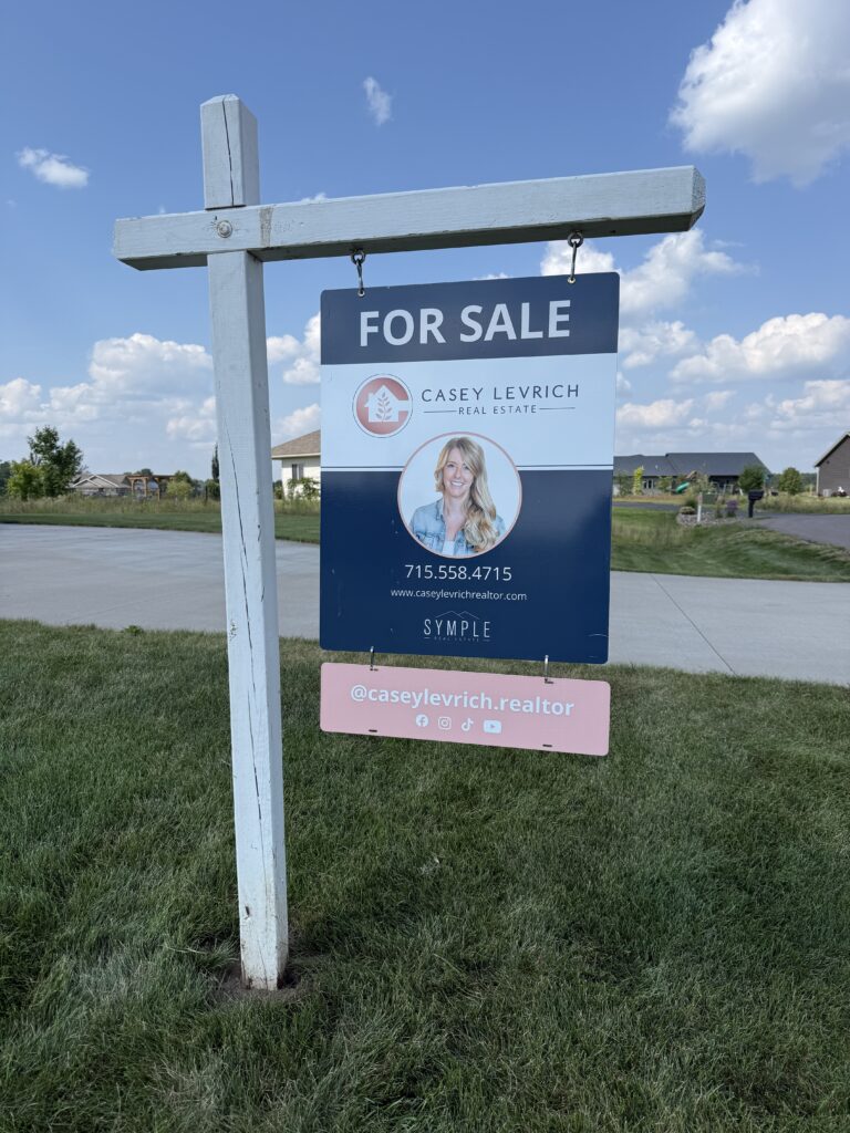 For sale sign in front of home in the Chippewa Valley Wisconsin